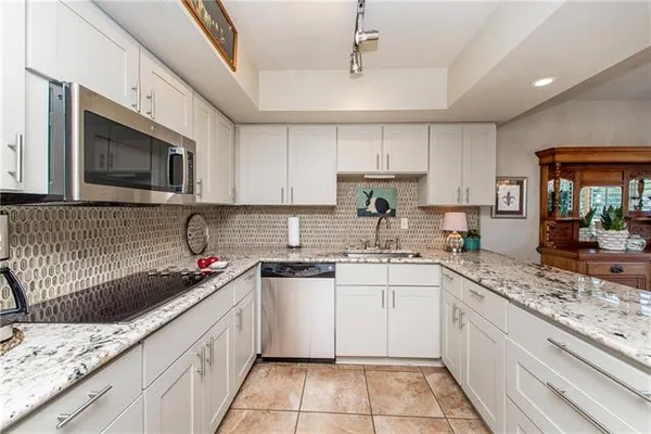 $600,000 | 100 Tchefuncte Oaks Drive, Unit 100, Mandeville, LA 70471