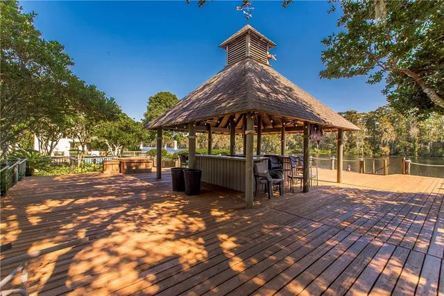 $600,000 | 100 Tchefuncte Oaks Drive, Unit 100, Mandeville, LA 70471