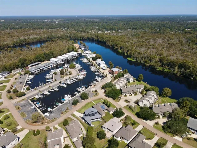 $600,000 | 100 Tchefuncte Oaks Drive, Unit 100, Mandeville, LA 70471