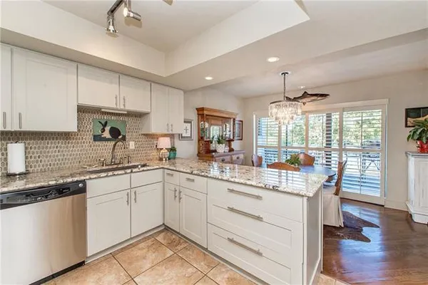 $600,000 | 100 Tchefuncte Oaks Drive, Unit 100, Mandeville, LA 70471