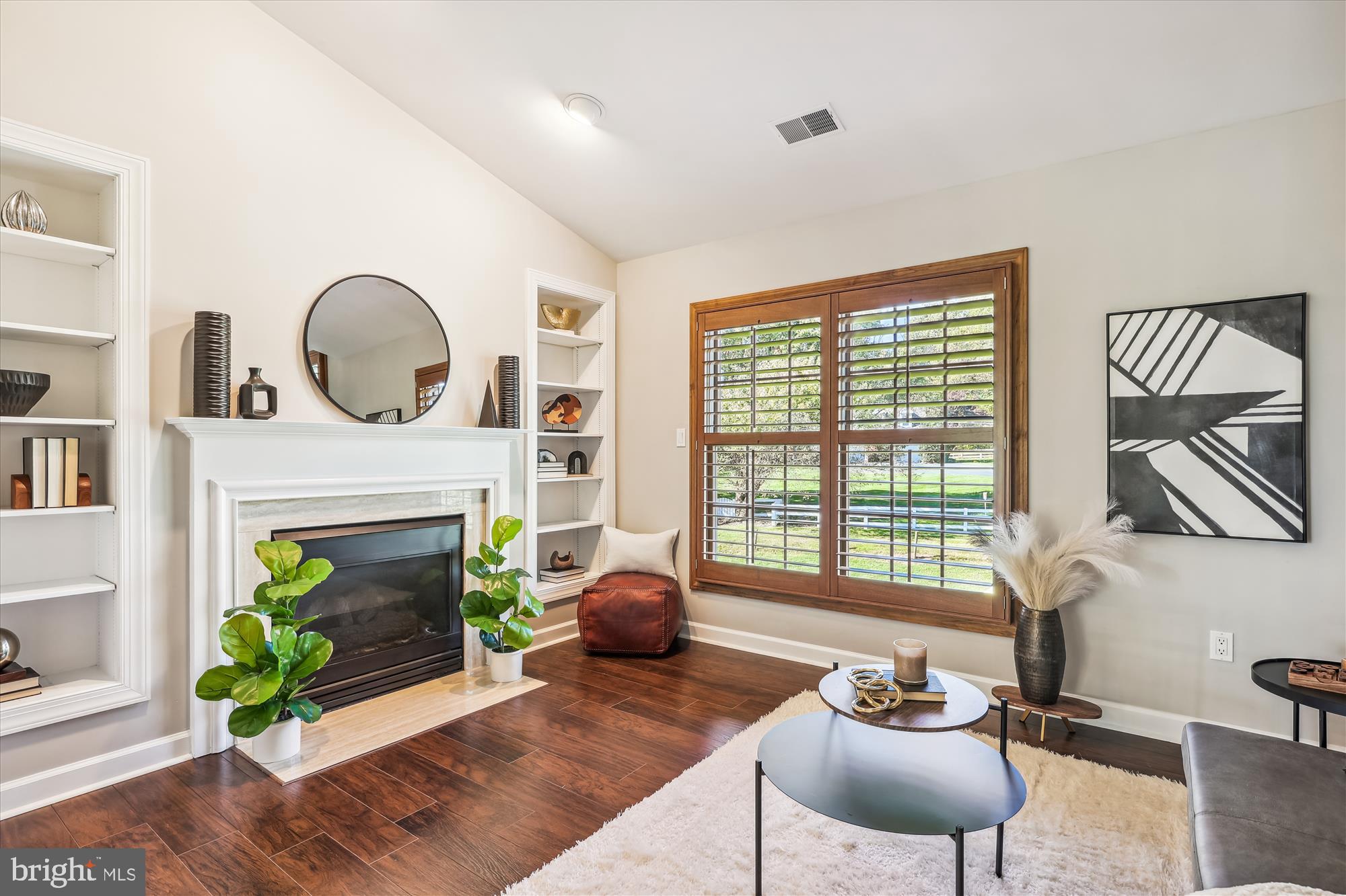 1162 Meadowlook Court Reston, VA 20194 - Photo 37 of 86 Sitting Room w/ Built-In Shelving & Gas Fireplace