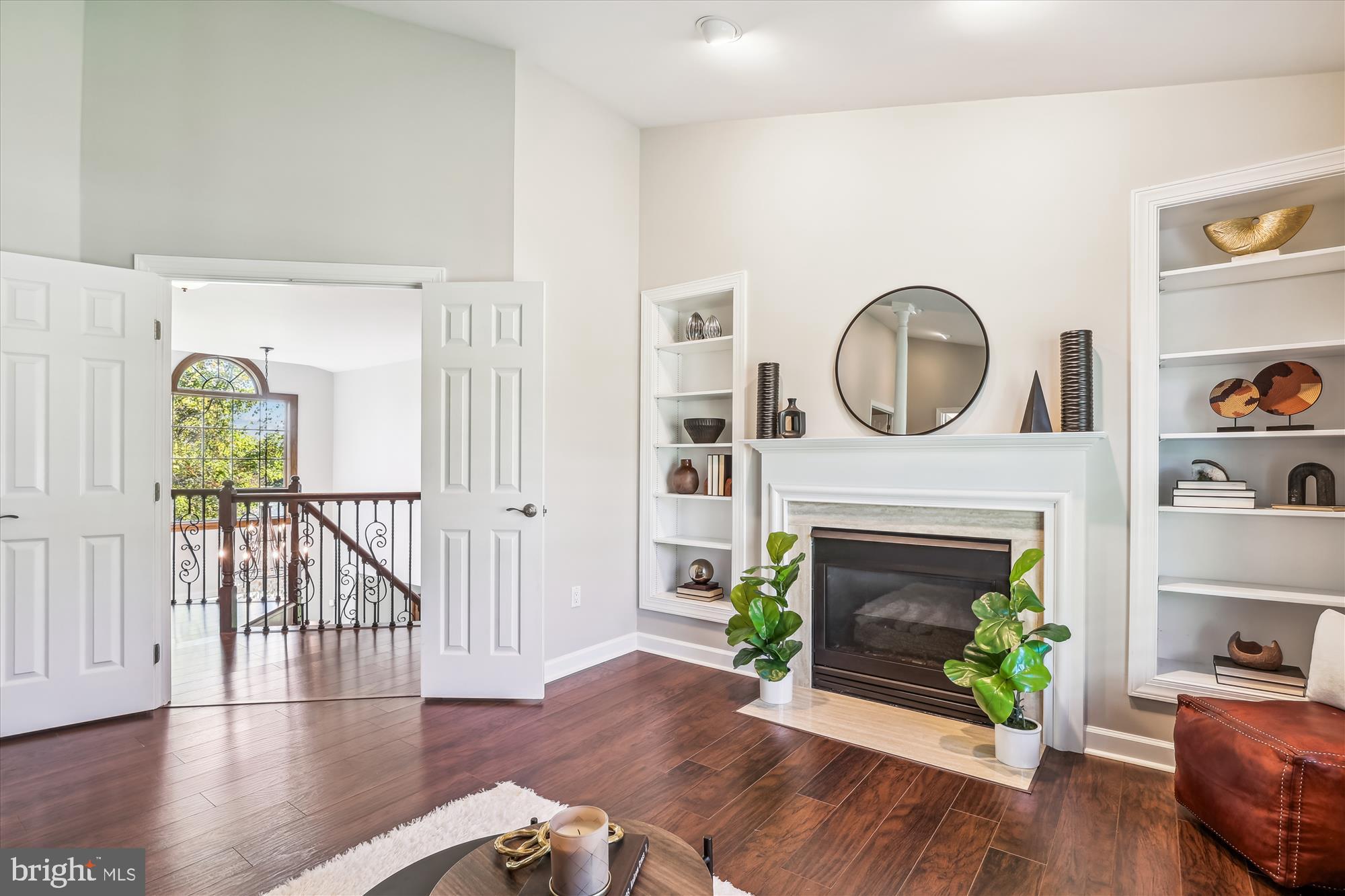 1162 Meadowlook Court Reston, VA 20194 - Photo 38 of 86 Sitting Room w/ Built-In Shelving & Gas Fireplace