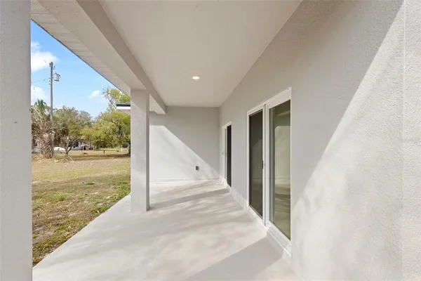 a view of ocean from a hallway