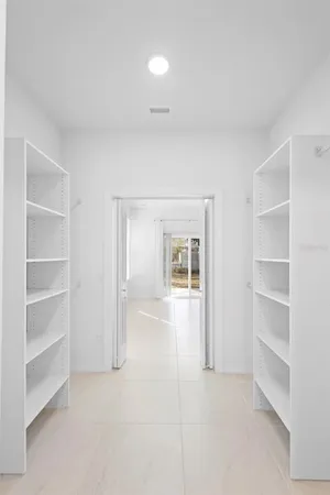 an empty room with windows