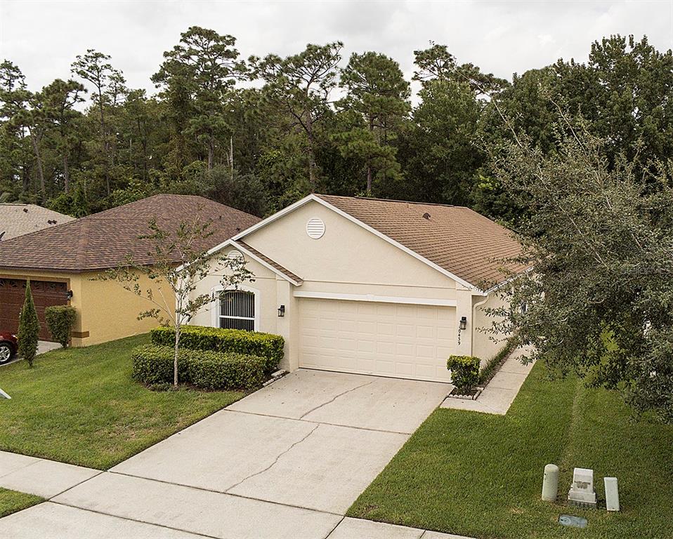 10439 Rocking A Run Orlando, FL 32825 - Photo 1 of 1 HOA owned Conservation behind and pond in front