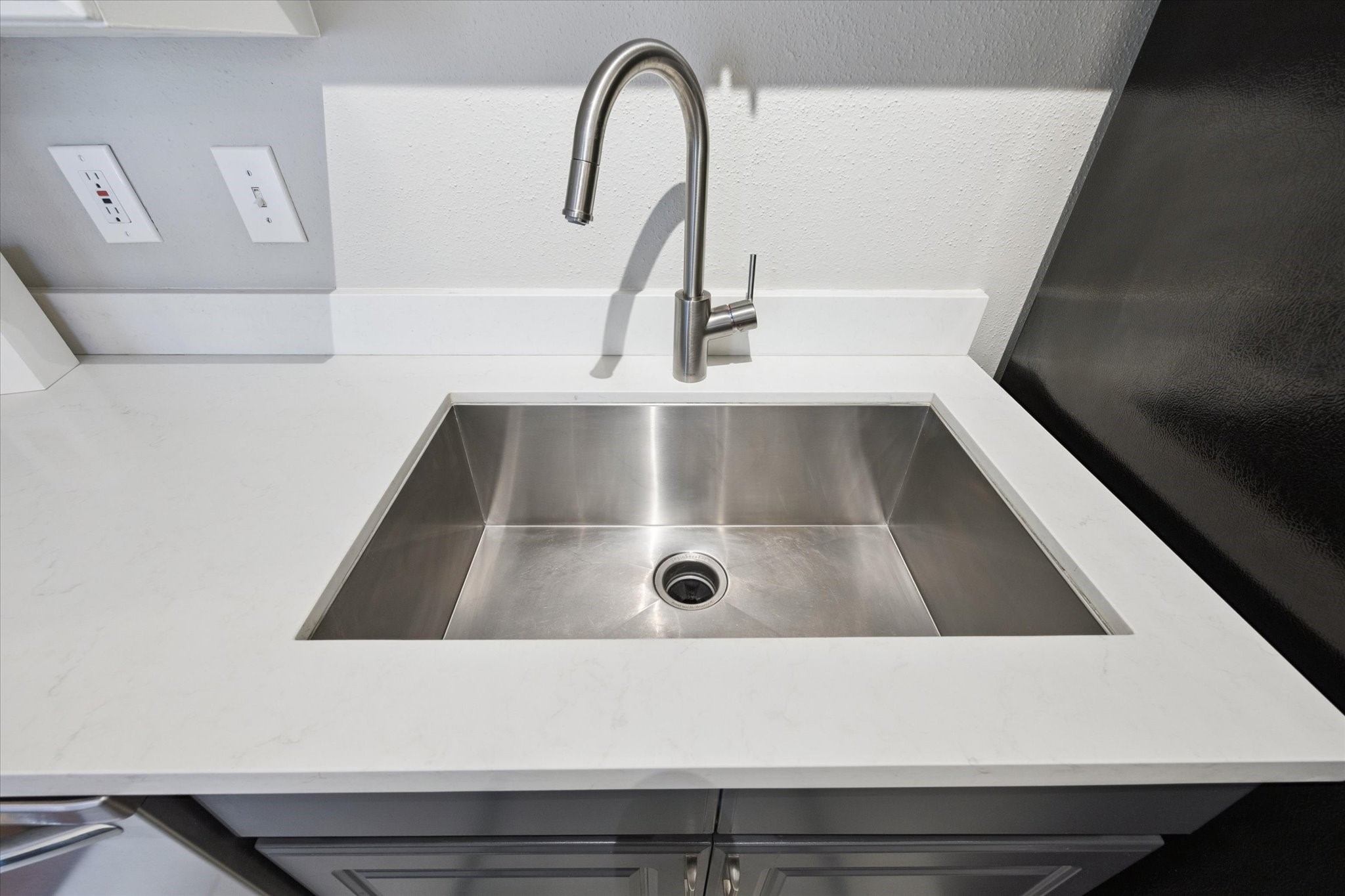 4041 Drake Street, Unit 113 Houston, TX 77005 - Photo 9 of 15 Upgraded stainless sink in the kitchen.