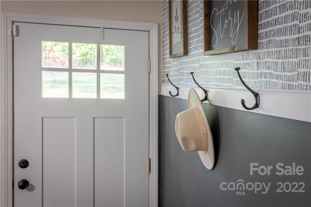 629 Blacksnake Road Stanley, NC 28164 - Photo 4 of 17 a close view of a sink and a mirror
