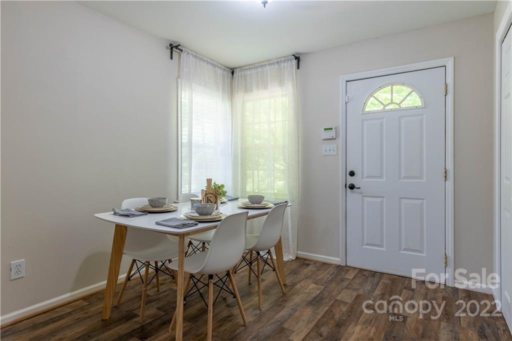 629 Blacksnake Road Stanley, NC 28164 - Photo 8 of 17 a view of a dining room with furniture and window