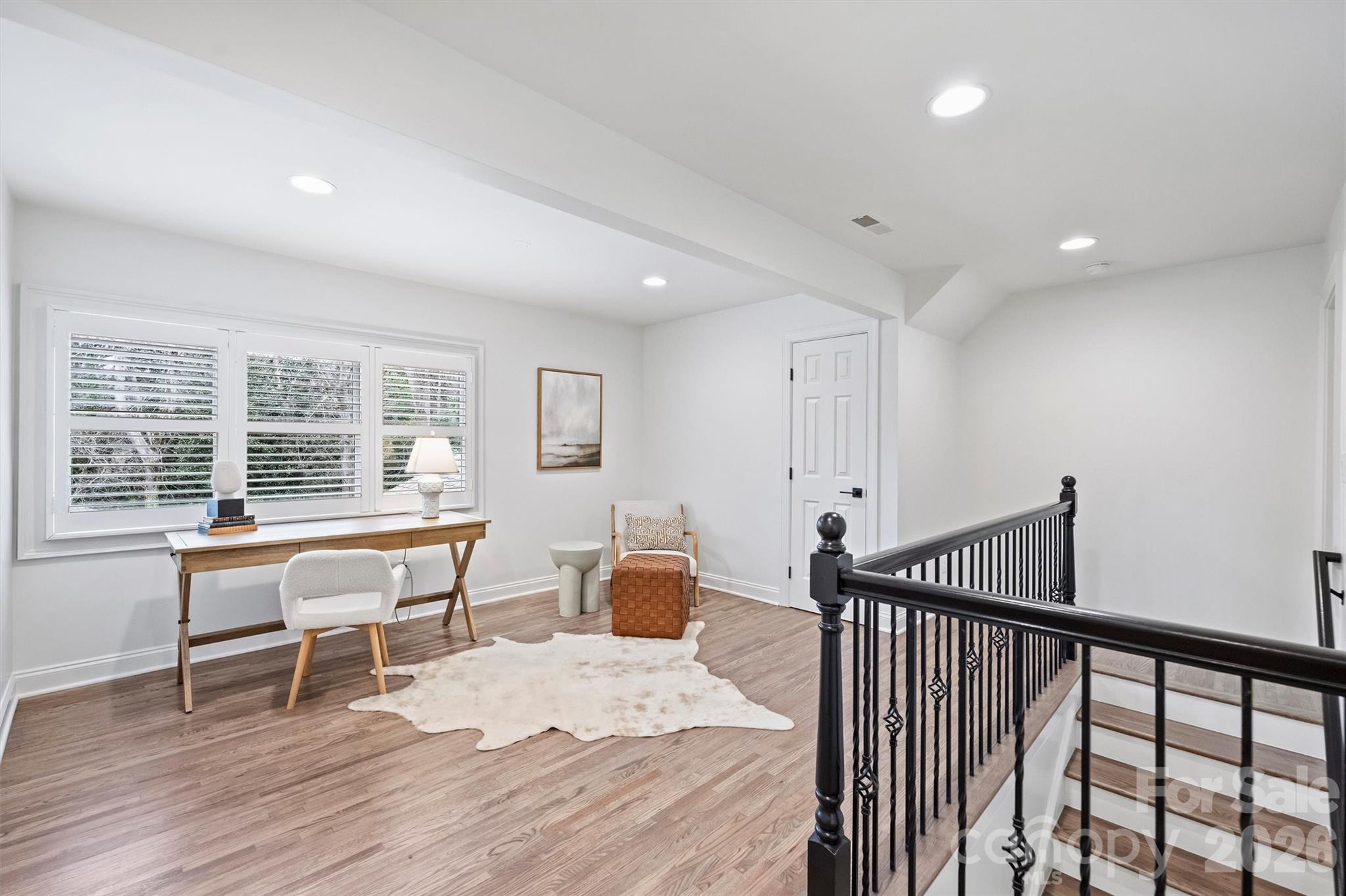 830 Jefferson Drive Charlotte, NC 28270 - Photo 26 of 44 a work space with wooden floor and furniture