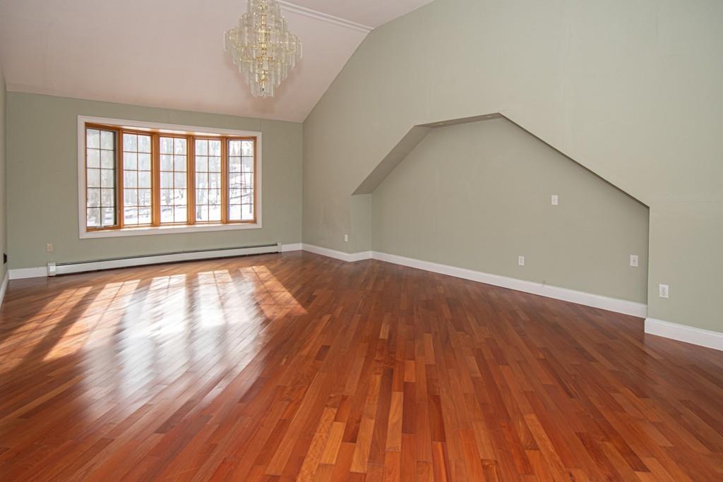 1103 Morgan Road West Springfield, MA 01089 - Photo 11 of 22 wooden floor in an empty room with a window