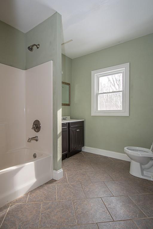 1103 Morgan Road West Springfield, MA 01089 - Photo 14 of 22 a bathroom with a bathtub and a toilet