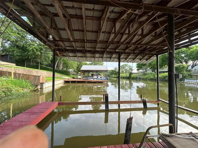 a view of swimming pool with a patio