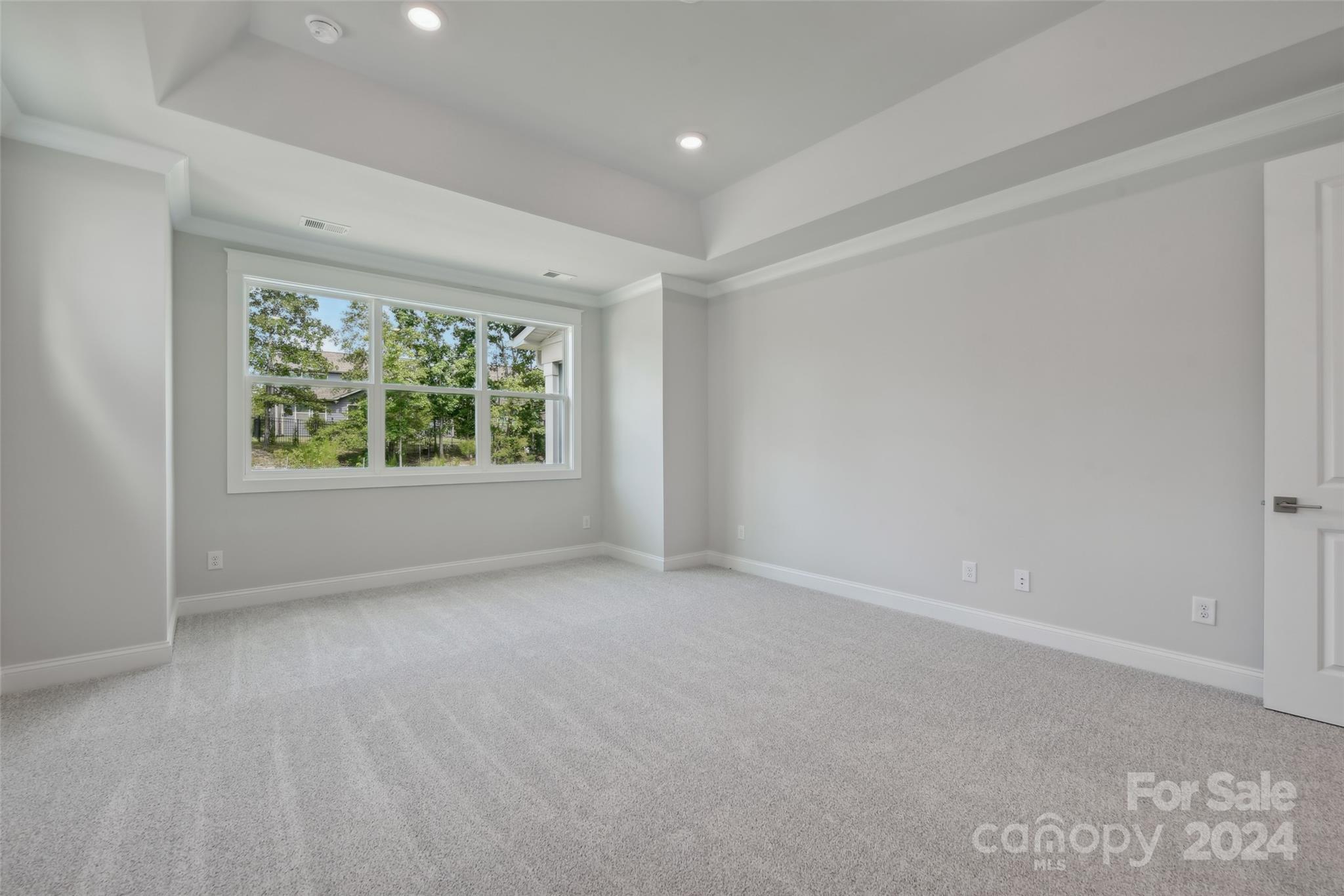 142 Windy Dell Drive Tega Cay, SC 29708 - Photo 14 of 20 an empty room with windows