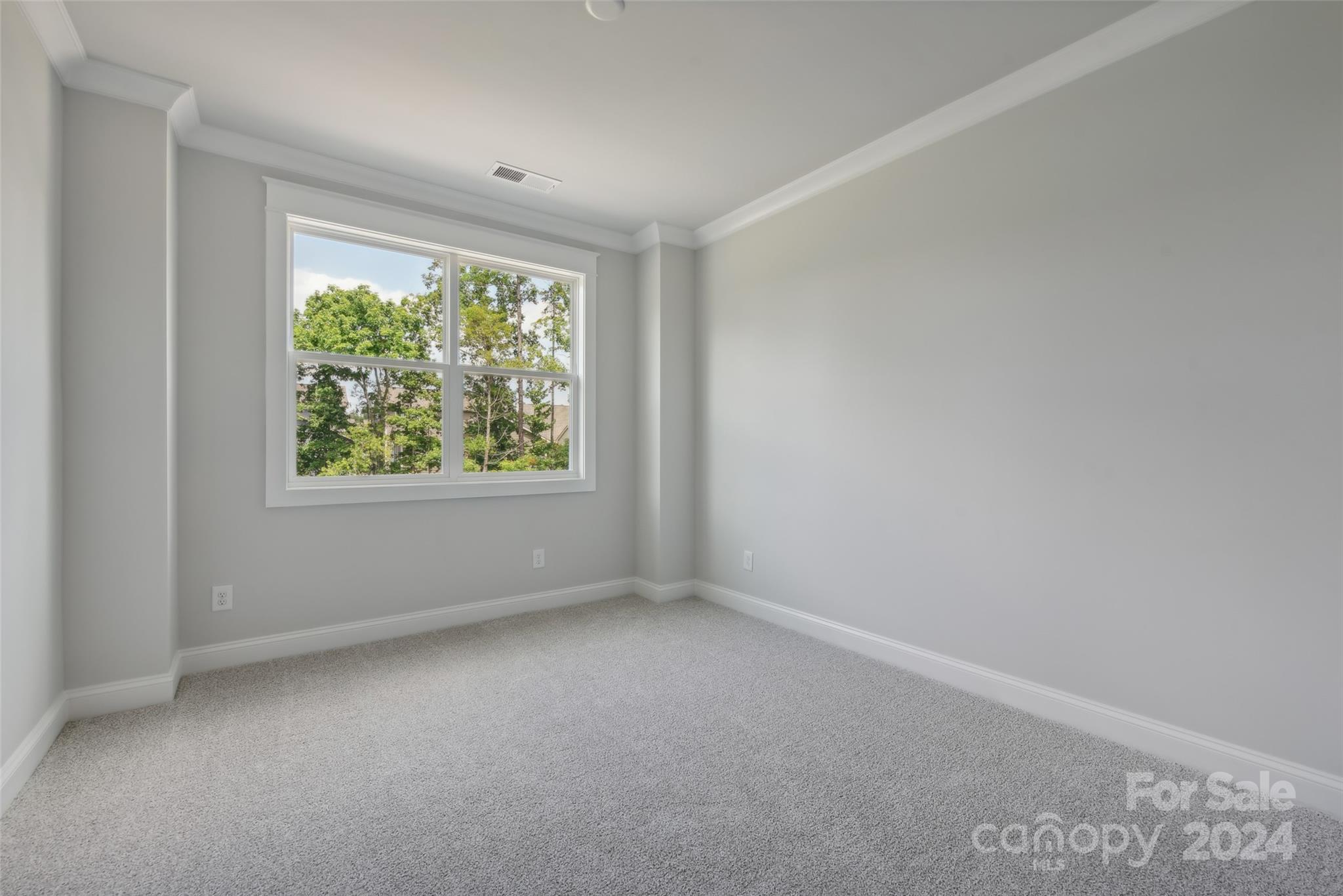 142 Windy Dell Drive Tega Cay, SC 29708 - Photo 18 of 20 an empty room with a window