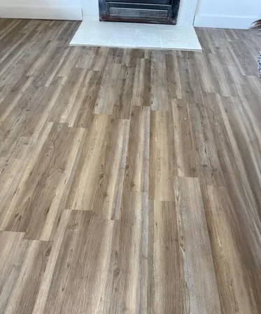 a view of outdoor space with wooden floor