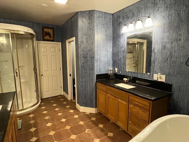 9537 Wamble Road Oakdale, CA 95361 - Photo 17 of 29 a bathroom with a sink a toilet and shower