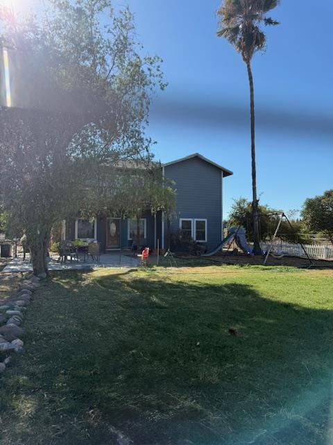 9537 Wamble Road Oakdale, CA 95361 - Photo 6 of 29 a front view of a house with garden