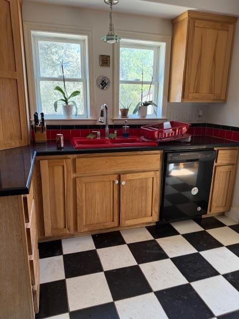 9537 Wamble Road Oakdale, CA 95361 - Photo 7 of 29 a kitchen with a black white checkered floor and a window