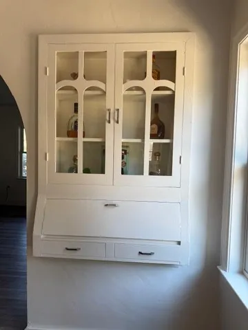 a view of an entryway with wooden floor