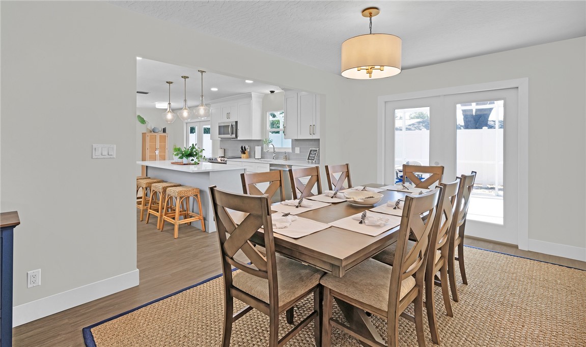 7989 143rd Street Sebastian, FL 32958 - Photo 7 of 30 a dining room with furniture and window