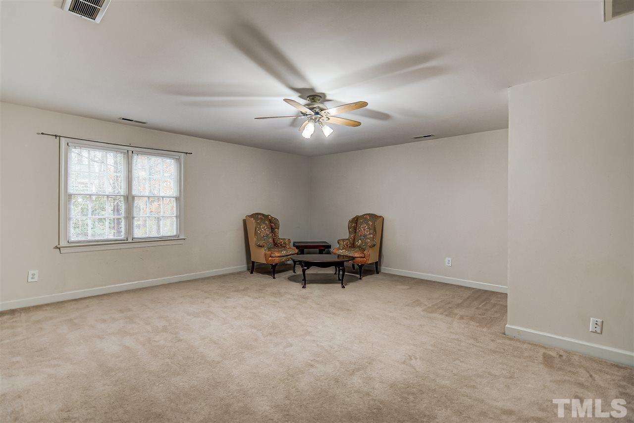 5121 Celbridge Place Raleigh, NC 27613 - Photo 19 of 22 a view of workspace with lounge chair
