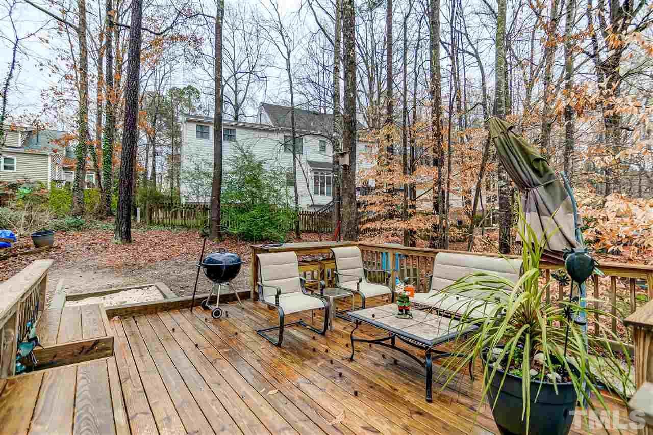 5121 Celbridge Place Raleigh, NC 27613 - Photo 22 of 22 a view of balcony with wooden floor and outdoor seating