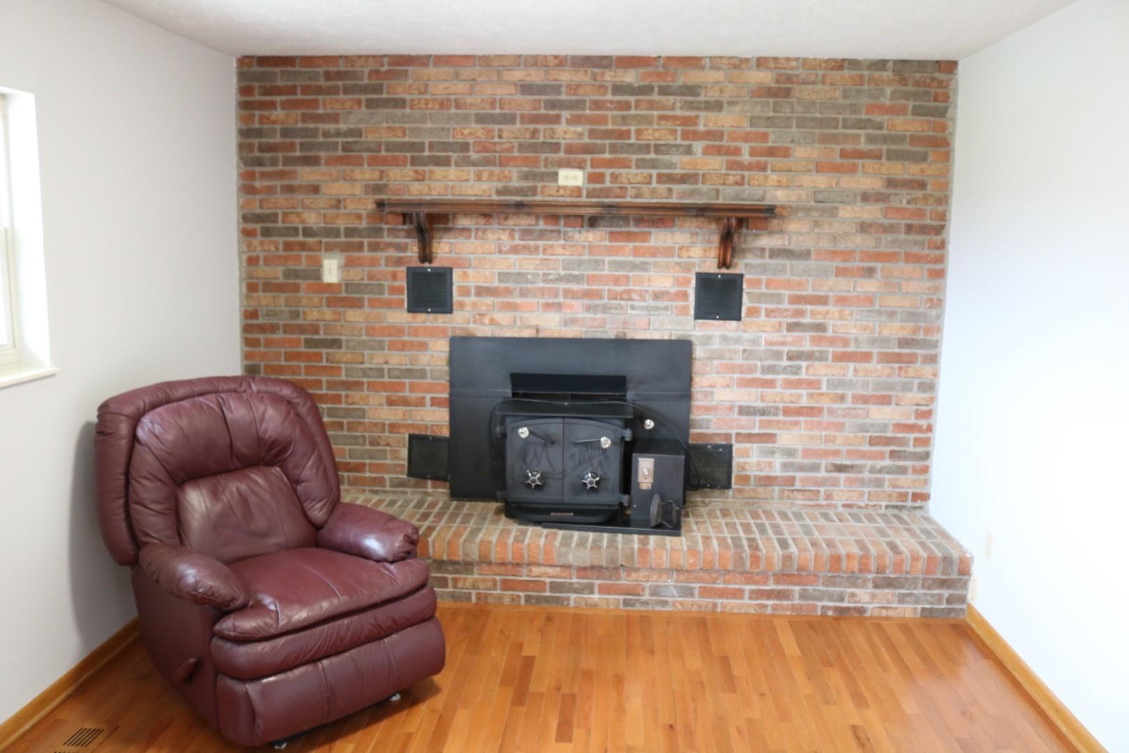 534 North White Pine Road Talbott, TN 37877 - Photo 4 of 23 wood burning stove in fireplace