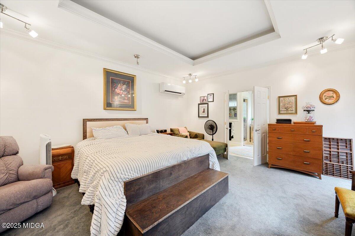 1414 Park Avenue Perry, GA 31069 - Photo 20 of 37 a spacious bedroom with a bed and furniture