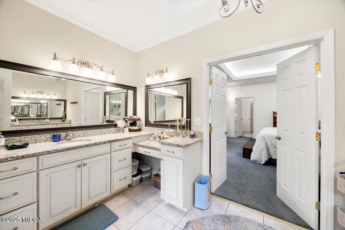 1414 Park Avenue Perry, GA 31069 - Photo 23 of 37 a room with a sink and a mirror