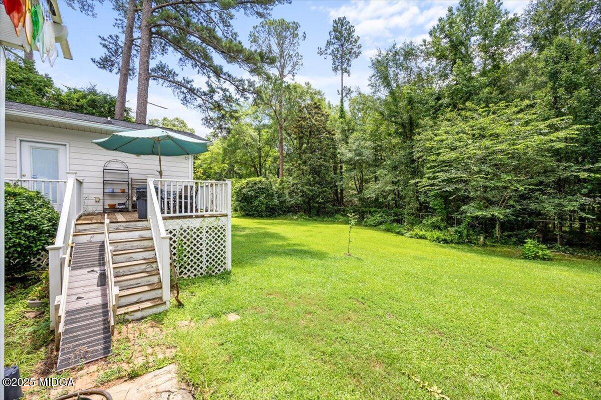 1414 Park Avenue Perry, GA 31069 - Photo 29 of 37 a view of a house with a yard