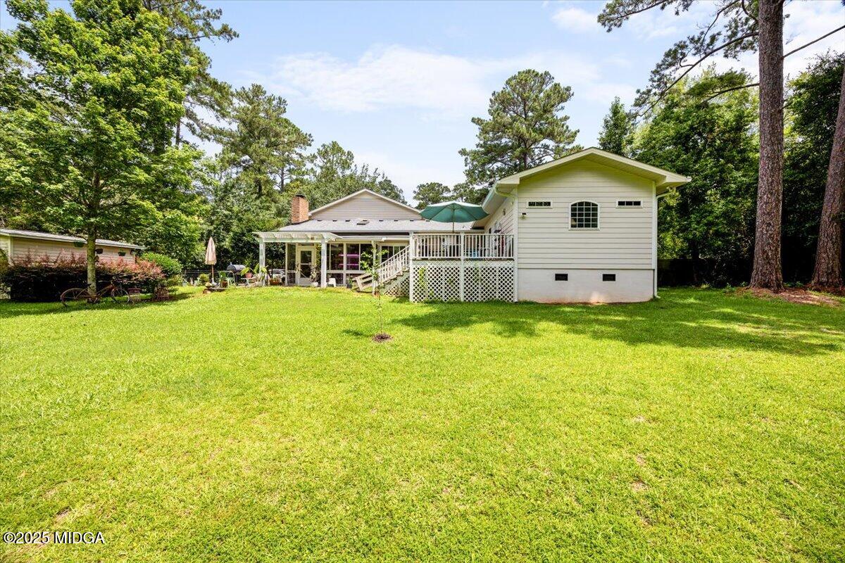 1414 Park Avenue Perry, GA 31069 - Photo 33 of 37 a view of a house with a yard and sitting area