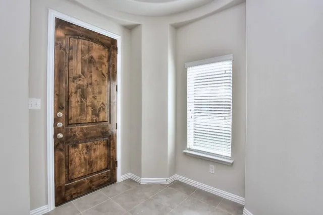 a view of a hallway with closet
