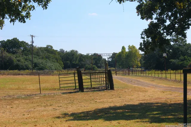 a view of a lake with a yard