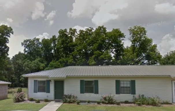 a view of a yard in front of a house