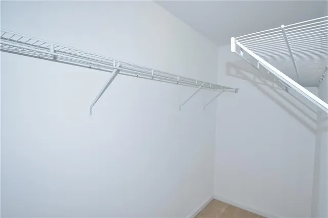 a view of a room with racks on the wall