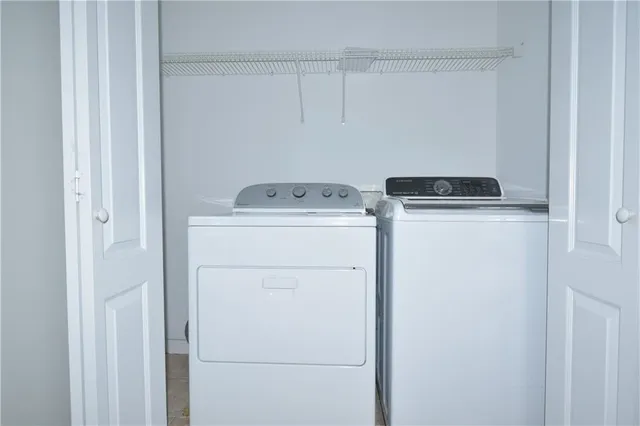 a utility room with dryer and washer