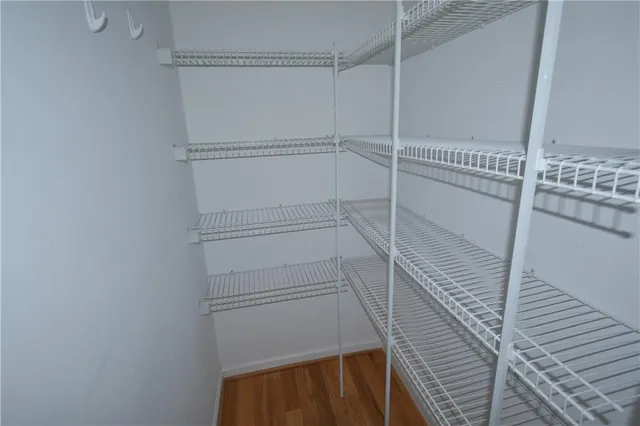 a view of a room with racks on the wall