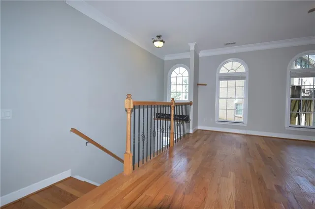 a view of entryway with wooden floor