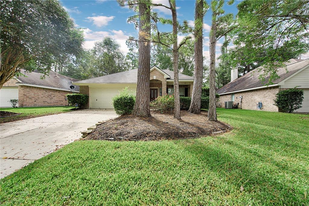 Welcome Home to 35 S Wynnoak Circle! Rare price point for The Woodlands.  Located within walking distance to community park