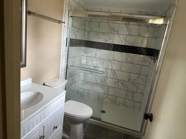 a view of a porch with furniture and yard