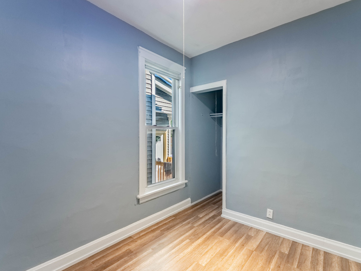 7041 South Throop Street Chicago, IL 60636 - Photo 15 of 36 an empty room with windows