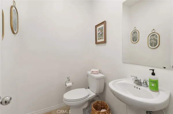 a bathroom with a toilet and a sink