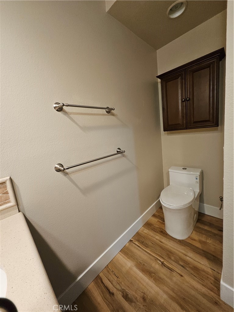 4481 Wyngate Circle Irvine, CA 92604 - Photo 30 of 42 a bathroom with a toilet and a sink