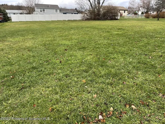 a view of an outdoor space and a yard