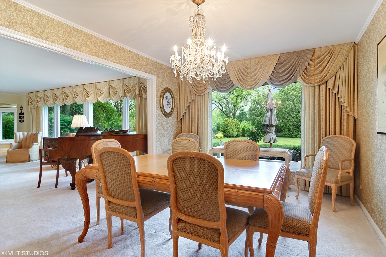 196 Coach Road Northfield, IL 60093 - Photo 14 of 36 a dining room with furniture a large window and outside view