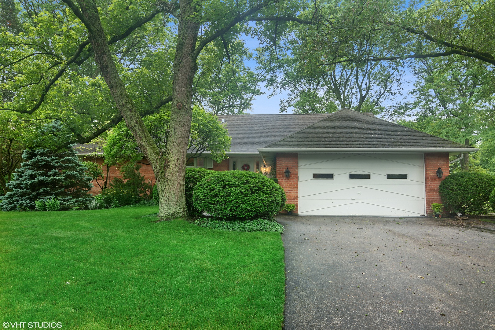 196 Coach Road Northfield, IL 60093 - Photo 3 of 36 a front view of a house with a yard