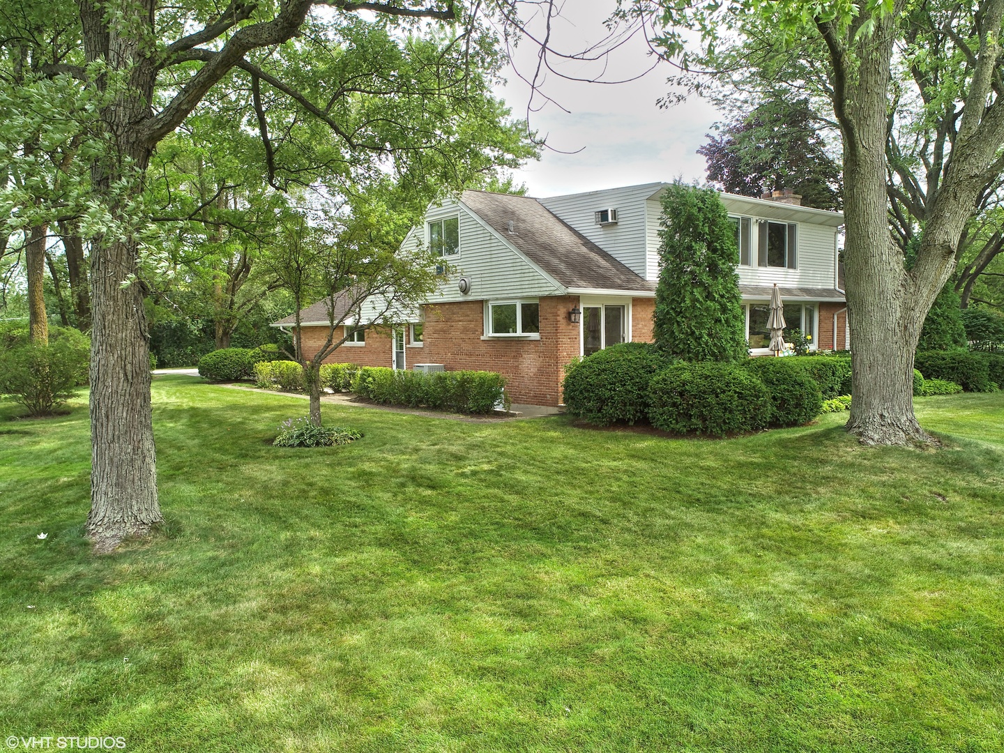 196 Coach Road Northfield, IL 60093 - Photo 32 of 36 a view of backyard of house with green space