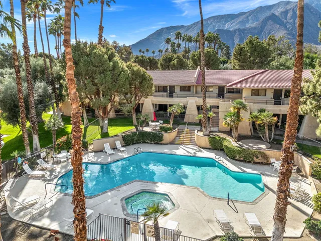 a view of a patio with swimming pool