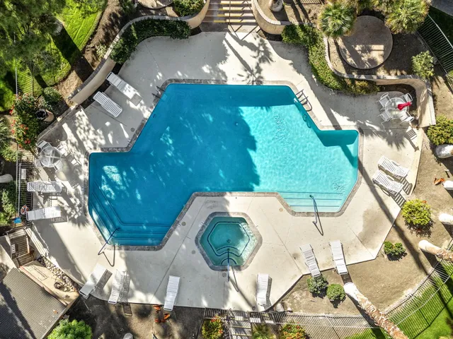 an aerial view of a swimming pool
