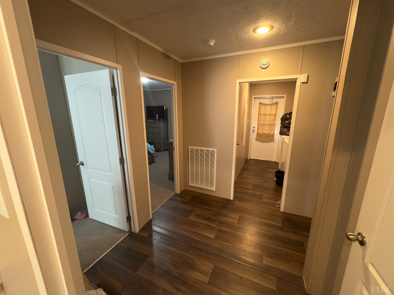 3772 Promise Land Road Appomattox, VA 24522 - Photo 19 of 28 a view of a hallway with wooden floor